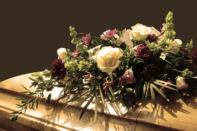 Flower arrangement on a casket