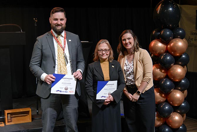 People receiving certificates